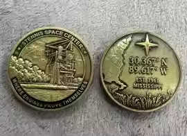 Antique brass Stennis coin proof front
